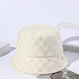 Cream checkered patterned bucket hat